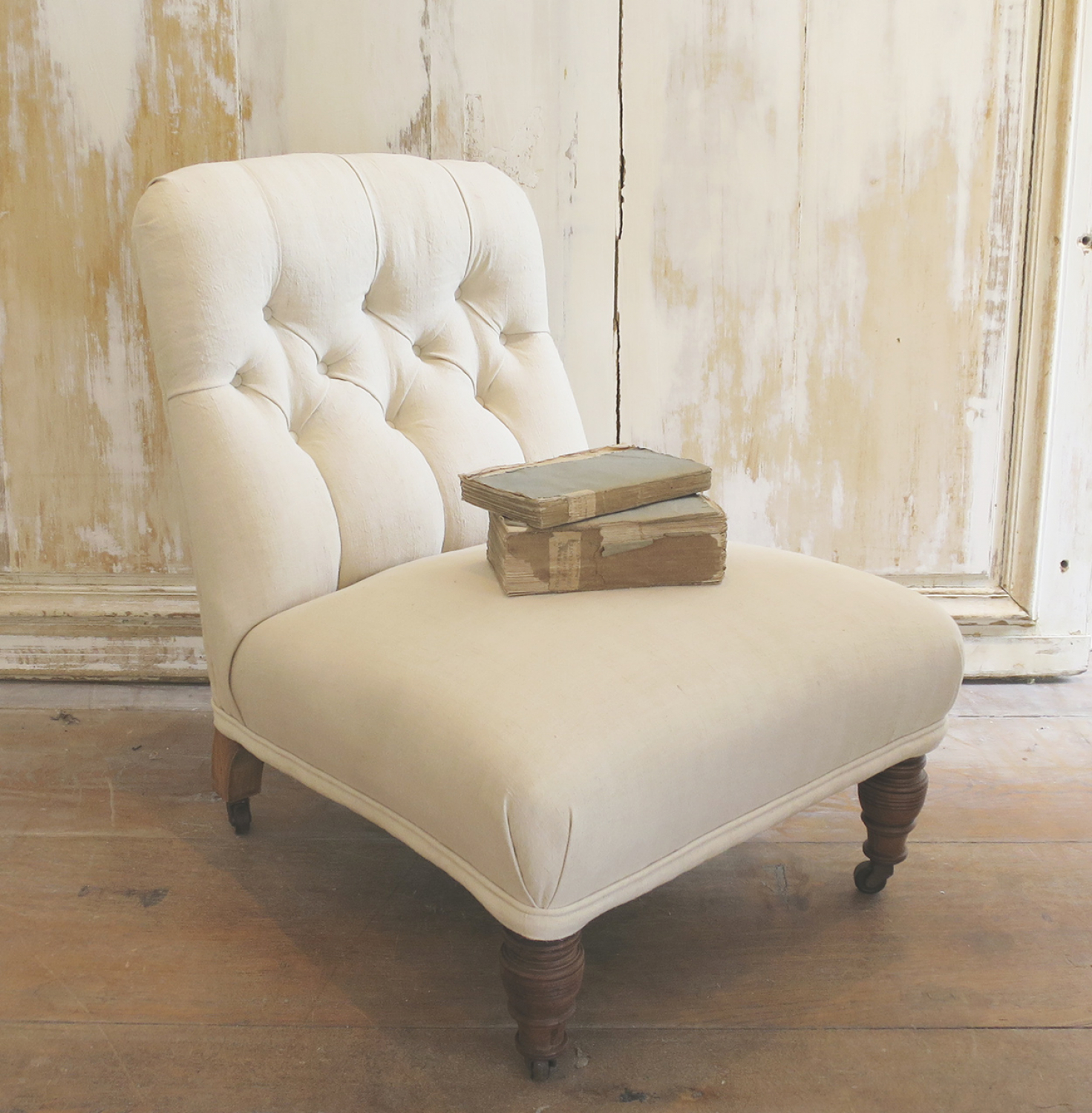 Small Buttoned Chair with original castors