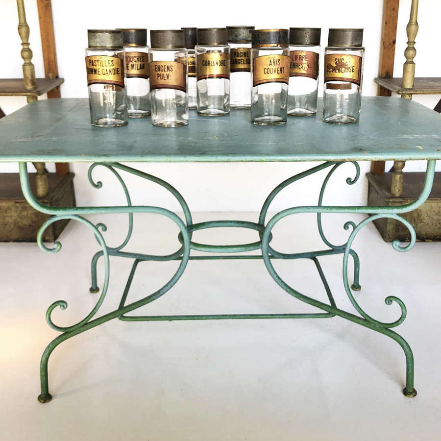 A classic 19th c French Wrought Iron Garden Table with old green paint