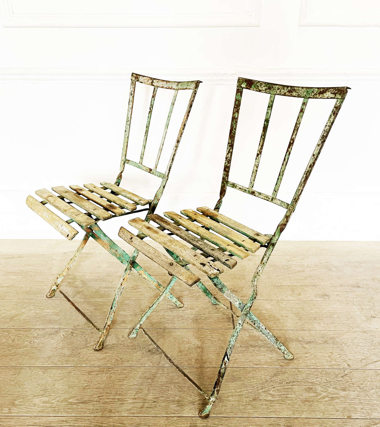 Pr. of French 20th century Folding Cafe Chairs - circa 1920
