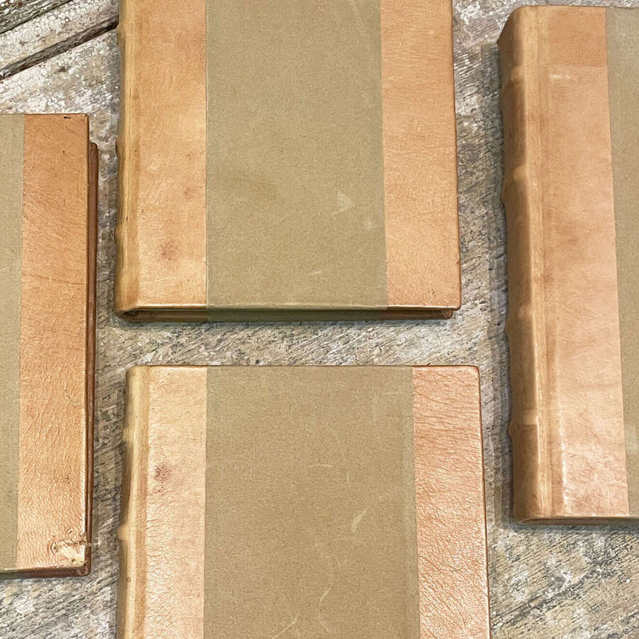 Set 4 French leather and suede bound Books c 1940